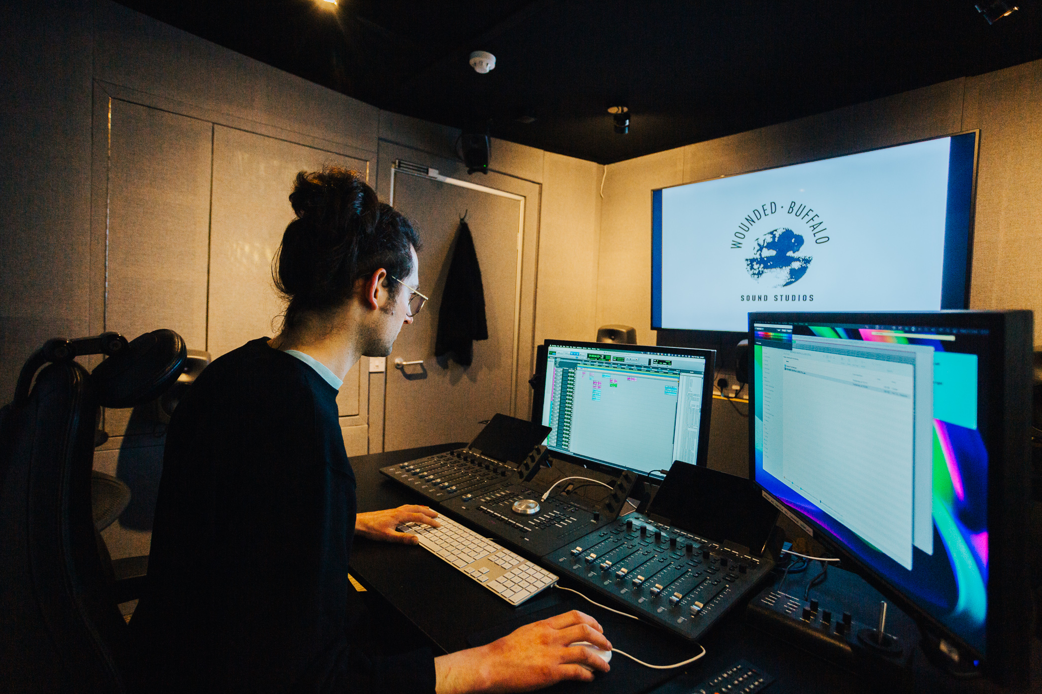 Barnaby Malins editing at Wounded Buffalo studio